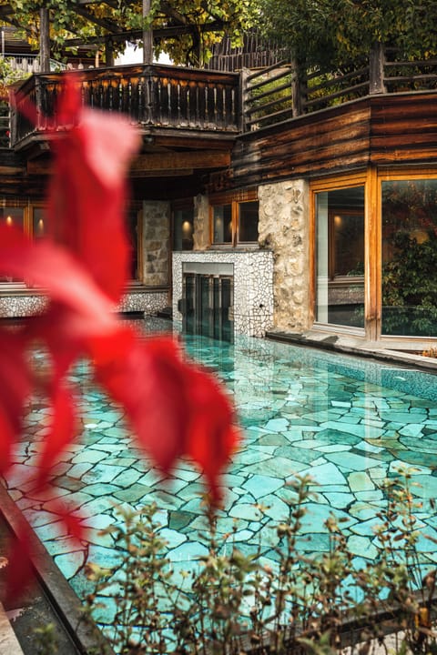 Indoor pool, outdoor pool, open 7:30 AM to 7 PM, pool umbrellas