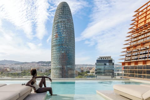 Seasonal outdoor pool, open 9:00 AM to 7:00 PM, sun loungers