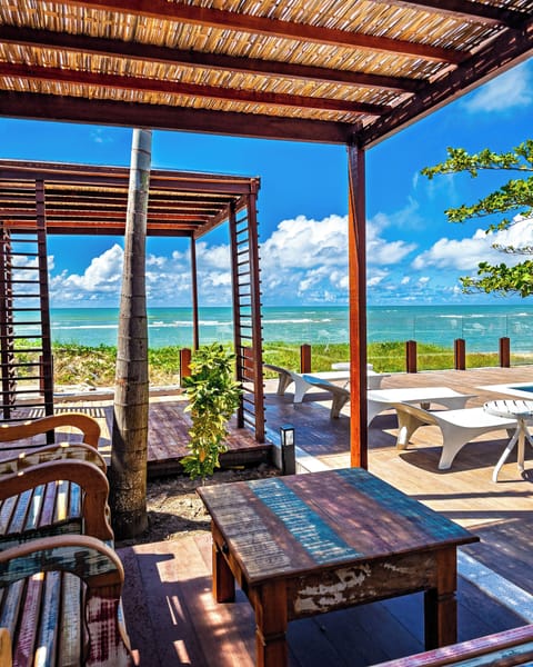 On the beach, sun loungers, beach bar