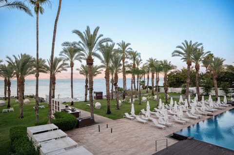 Outdoor pool, open 9:00 AM to 6:00 PM, sun loungers