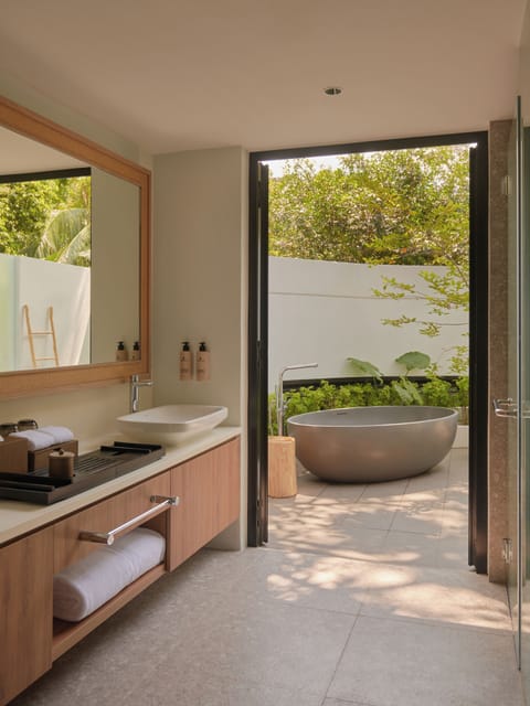 One Bedroom Pool Villa | Bathroom | Separate tub and shower, rainfall showerhead, free toiletries