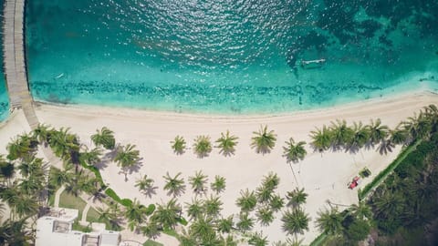 On the beach, white sand, free beach cabanas, sun loungers
