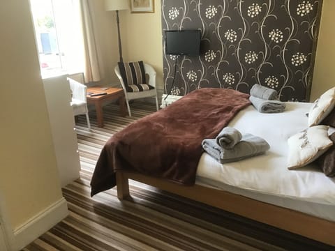 Desk, iron/ironing board, free WiFi, bed sheets