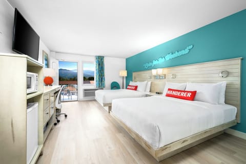 Premium bedding, down comforters, in-room safe, desk