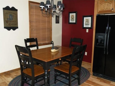 Dining Table Seats Six With Leaf Inserted.