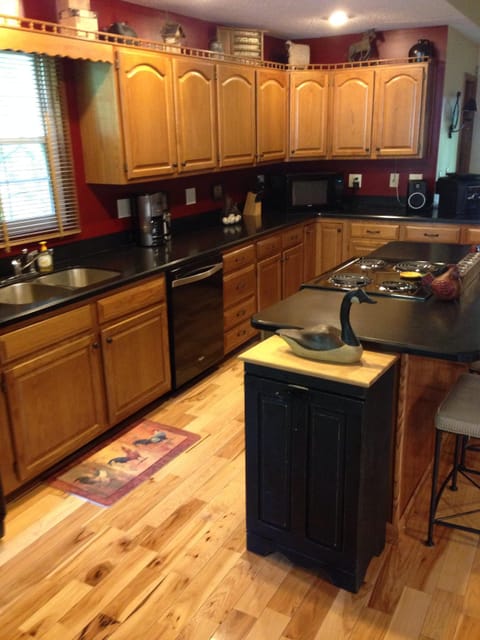 Kitchen With Cooking Island; Stocked With Cookware.
