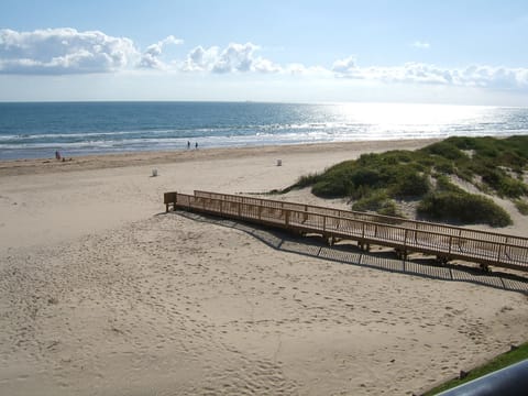 To get to the beach - go down to 1st floor, exit building & take this beach walk