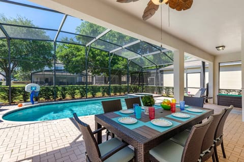 The lanai has a table that seats 8, privacy bushes, 4 lounge chairs & BBQ
