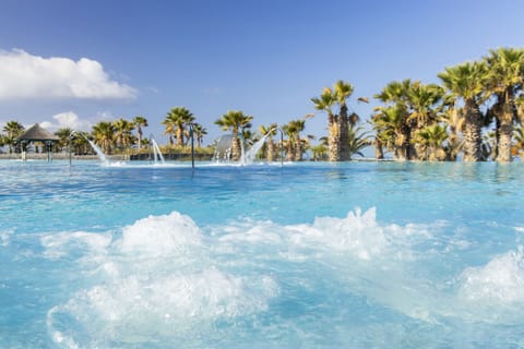3 outdoor pools, cabanas (surcharge), pool umbrellas