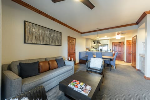 Living room, dinning table and kitchen