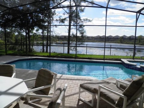 Beautiful view of south facing pool with Lake views