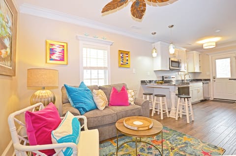 Professional decorated den with a 65 inch TV
