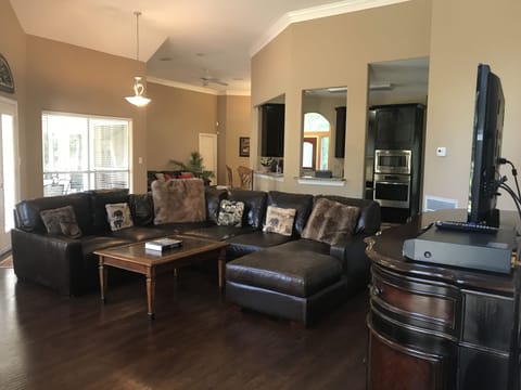 Back Living room with seating for 10
