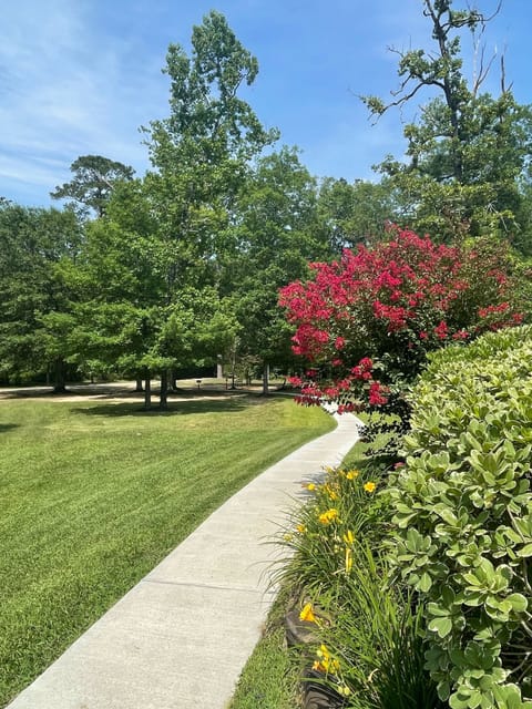 Paved to guest parking and nature trails.