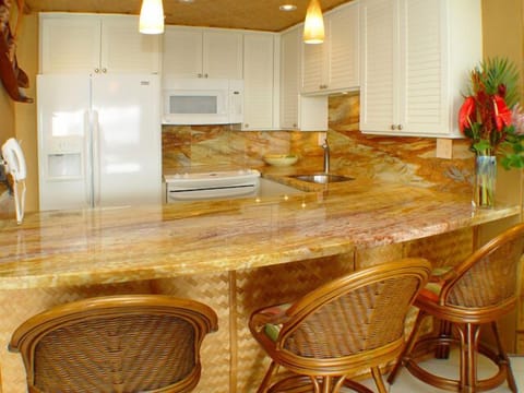 A clean kitchen with all the amenities you need