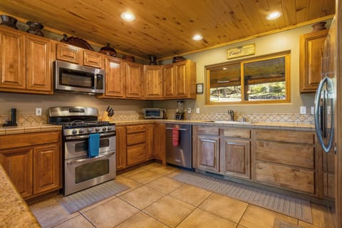 Kitchen has double oven, stainless appliances and everything you may need