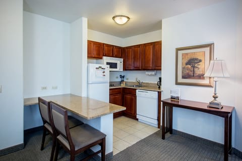 Suite, 1 Bedroom, Kitchen | Desk, laptop workspace, iron/ironing board, free cribs/infant beds