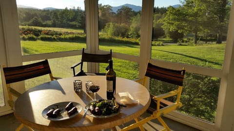Enjoy spectacular view of the White Mountains from screen porch