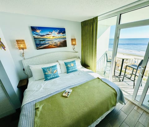 Newly remodeled King oceanfront suite! Wake up to magnificent sunrises from bed.