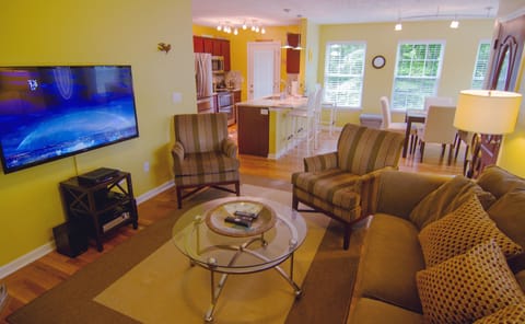 Living room view into Dining room and Kitchen.