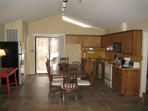 Full kitchen and large dining table
