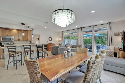 Family room, dining room, kitchen and smaller queen bedroom. There is a 75" TV