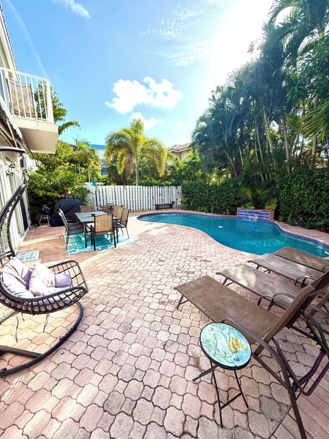 Fabulous pool area with lots of seating for barbecuing, relaxing swimming & fun!