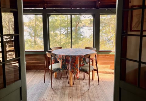Screened porch has a fantastic view of the lake.