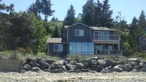 back of the house W/sunrm facing ocean 50 Ft from the beach 