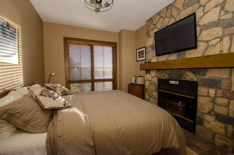 Bedroom with a Fireplace