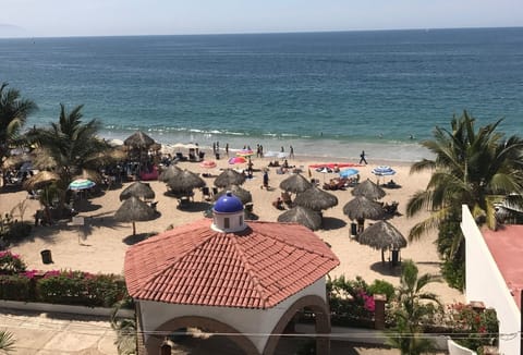 Stunning View of Blue Chairs Beach from Balcony