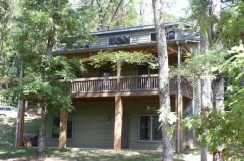 Front of house on wooded lot