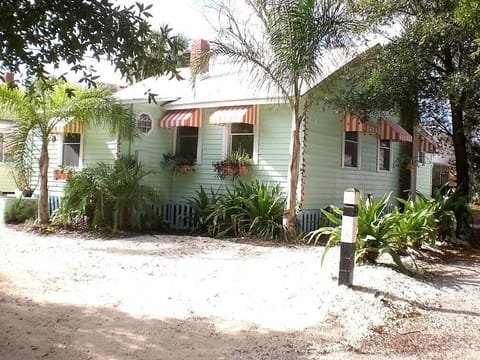 Lighthouse Cottage in former Ft. Screven.  NCO house. 1920.