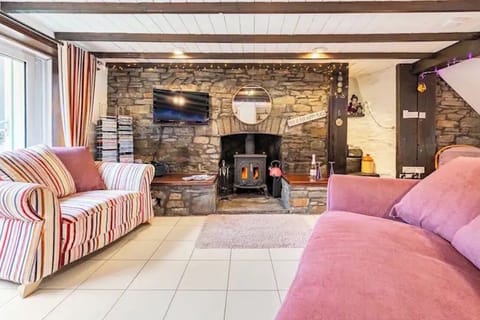 Large roomy Living Room with a Log-Fire.  Plus lots of D.V.D's to chose from. 