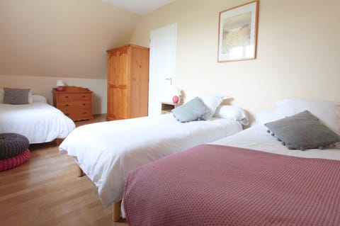 Bedroom 3 sleeps 3 persons singles or double configuration. On first floor.