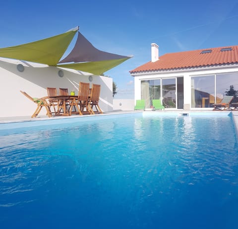 Outdoor pool with sea view
