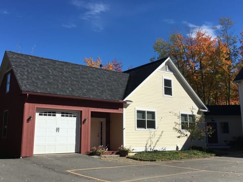 Front of house with attached one car garage
(notice pickle ball court lines!)
