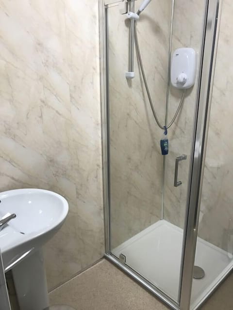 Shower, free toiletries, hair dryer, towels