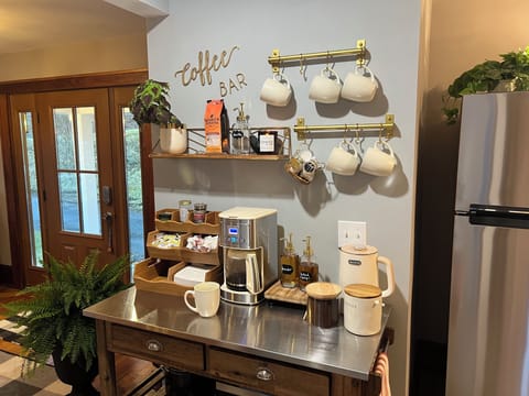 The entry opens to the kitchen and includes a coffee bar and gift of local Java!