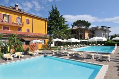 2 outdoor pools, pool umbrellas, sun loungers