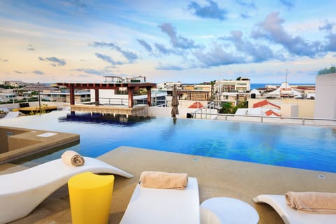 Outdoor pool, pool umbrellas, sun loungers
