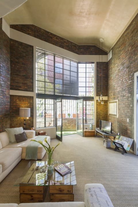 Deluxe Loft, 1 Queen Bed, City View | Living area | 41-inch Smart TV with digital channels, Netflix, streaming services
