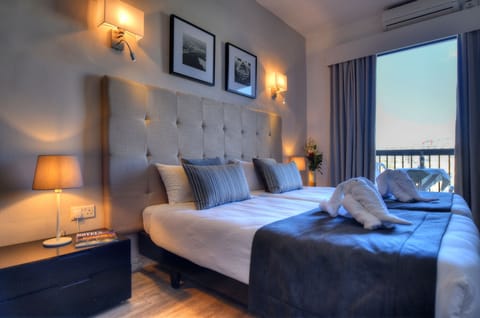 Double or Twin Room, Sea View | In-room safe, desk, blackout drapes, iron/ironing board