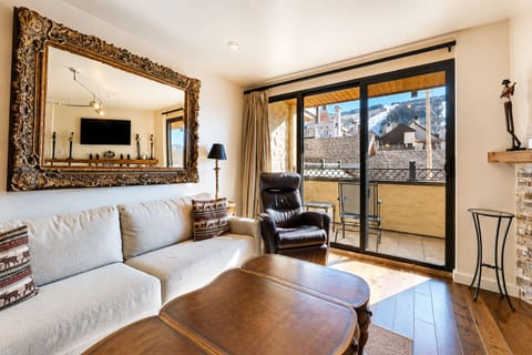 Cozy one bedroom living room overlooking Vail Mountain Trails. Perfect place for afternoons after skiing or relaxing on the patio in the summer.