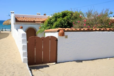 Street entrance with private parking area