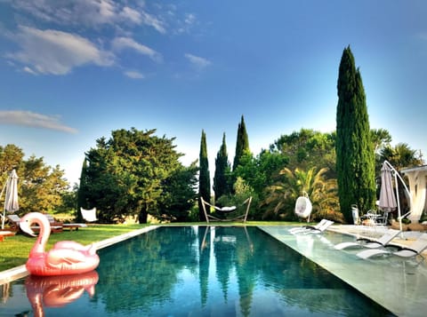 Outdoor pool, pool umbrellas, sun loungers