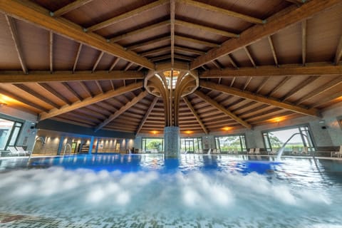 Indoor pool, seasonal outdoor pool, pool umbrellas, sun loungers