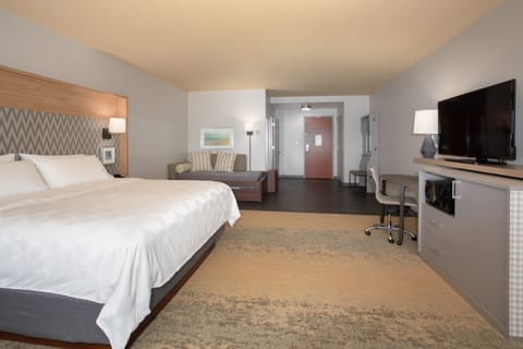 Suite, 1 King Bed (Additional Living Area) | In-room safe, desk, laptop workspace, blackout drapes