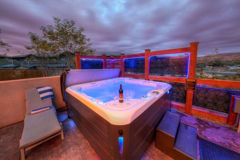 Come experience our private Hot Tub with sculpted seating for 7!