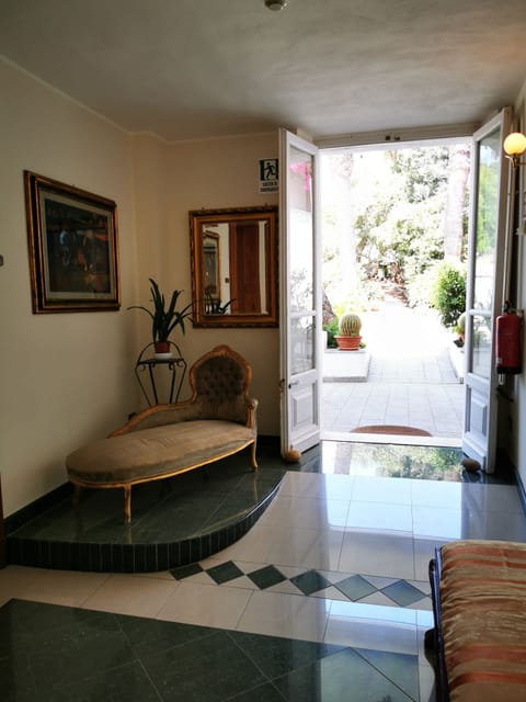 Deluxe Double or Twin Room | Living area | Flat-screen TV